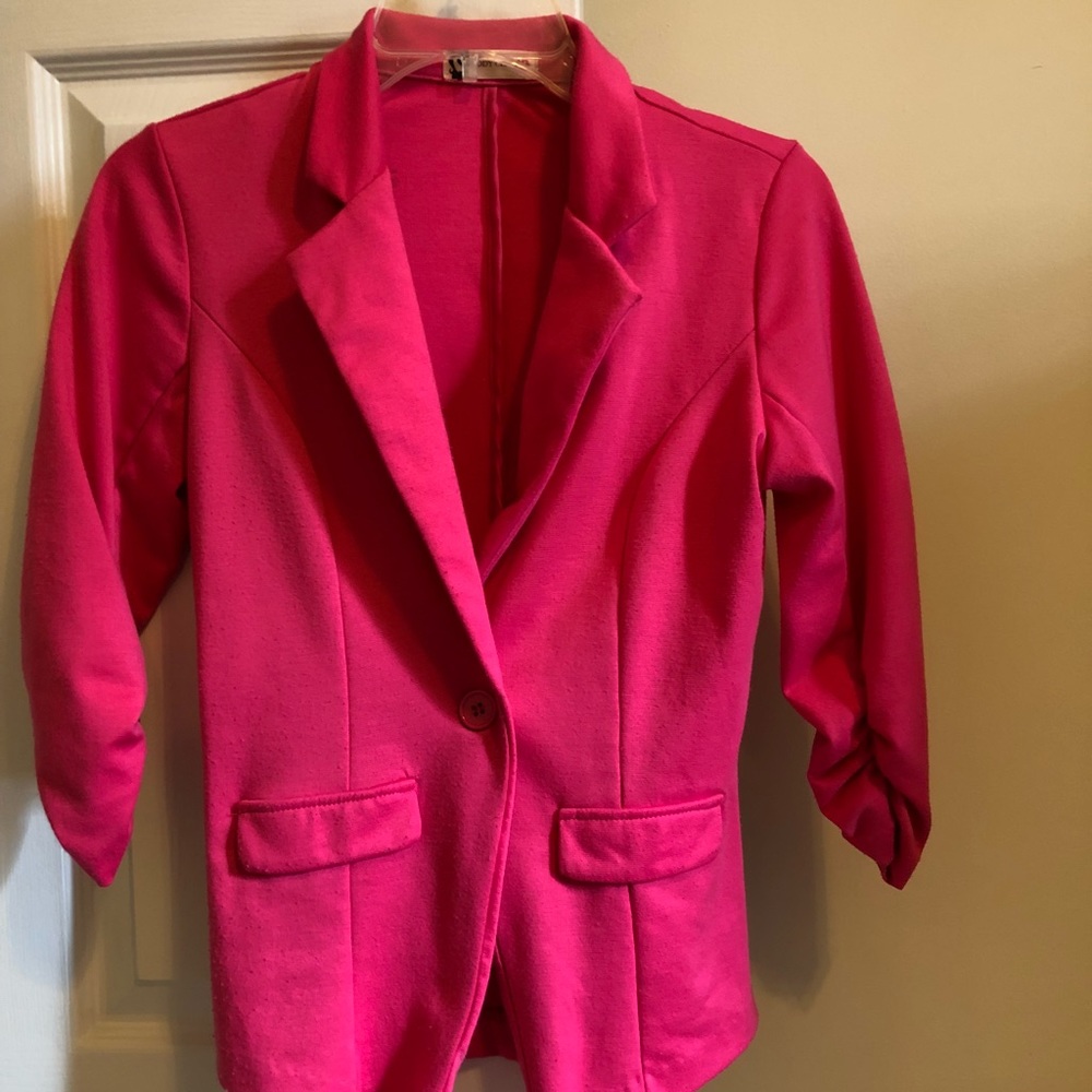 Hot pink blazer.